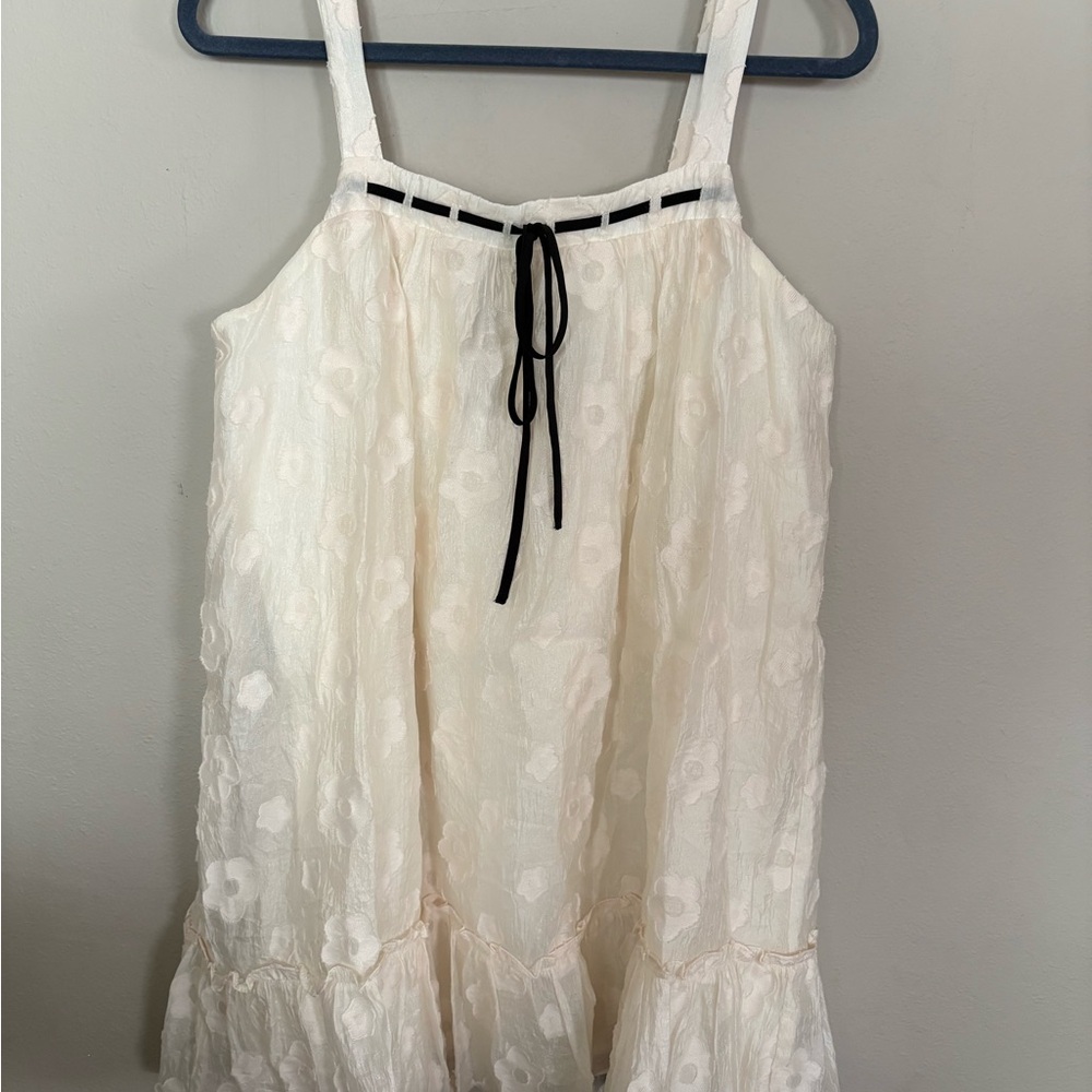 White Sleeveless Dress with Black Ribbon